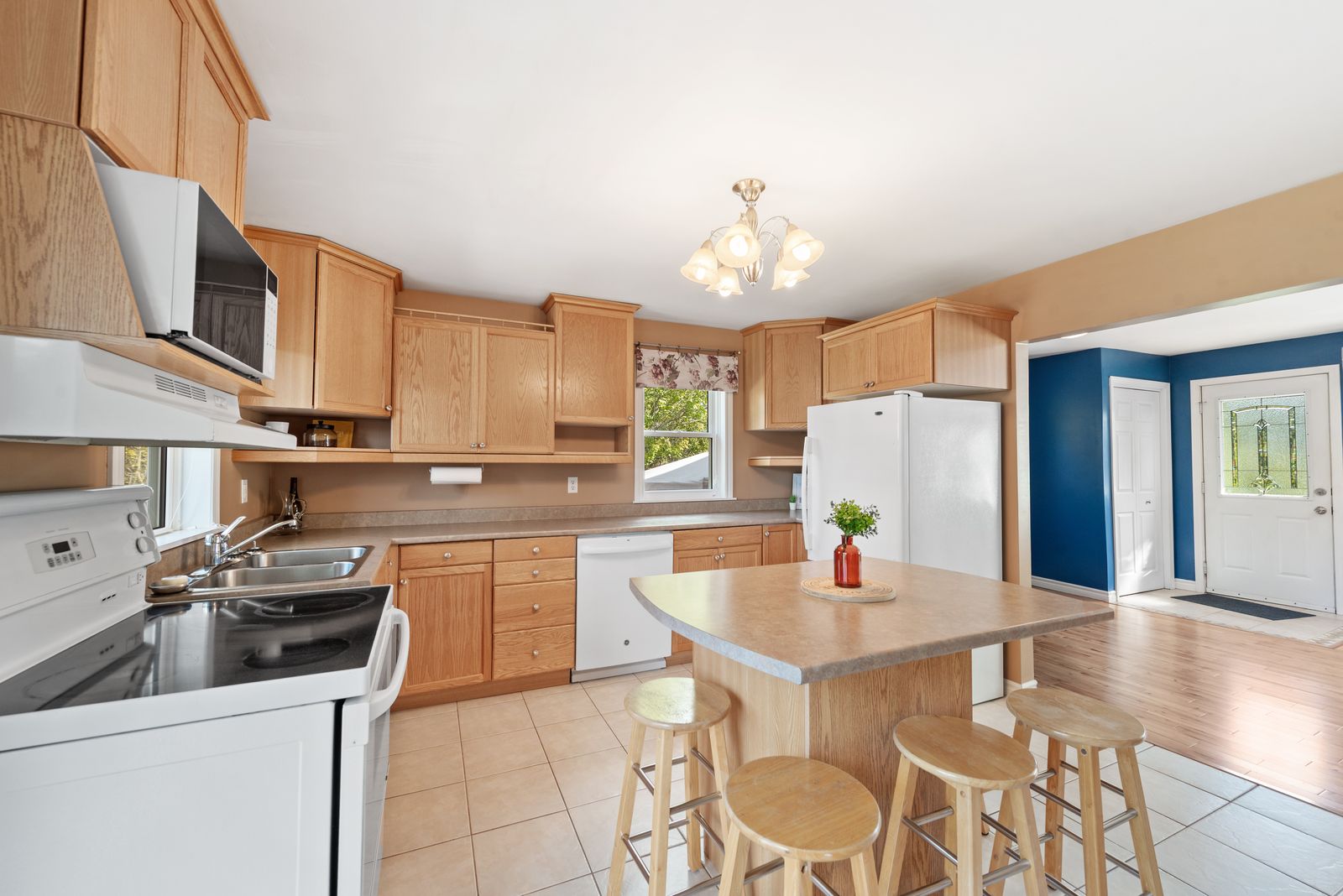 Kitchen with island and eat-in nook